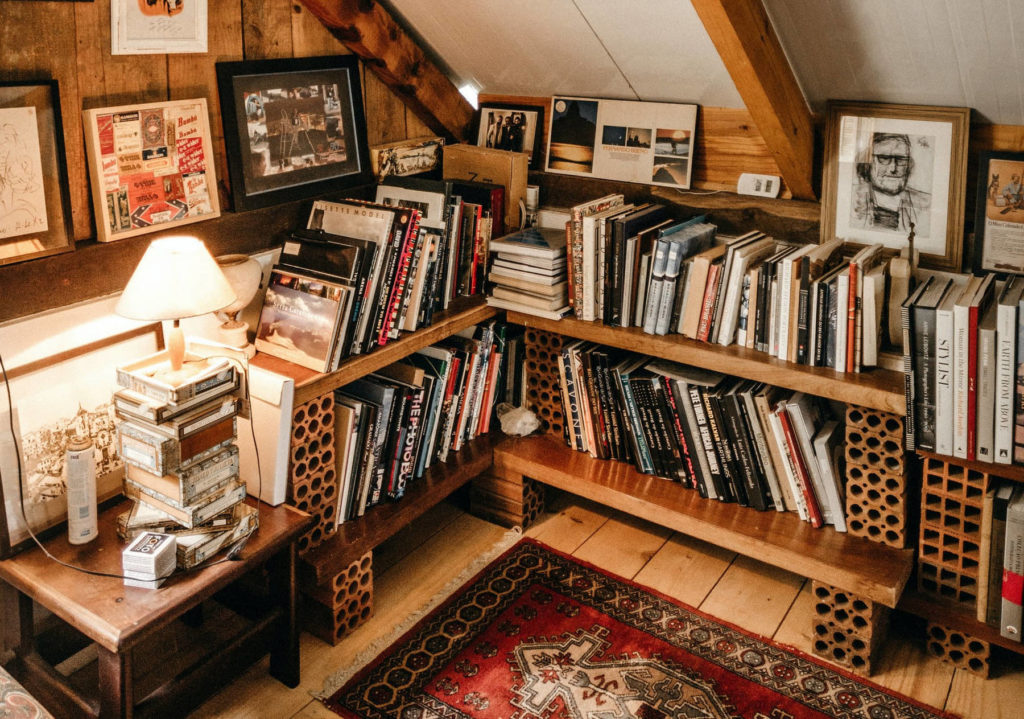 person staying home in their reading nook